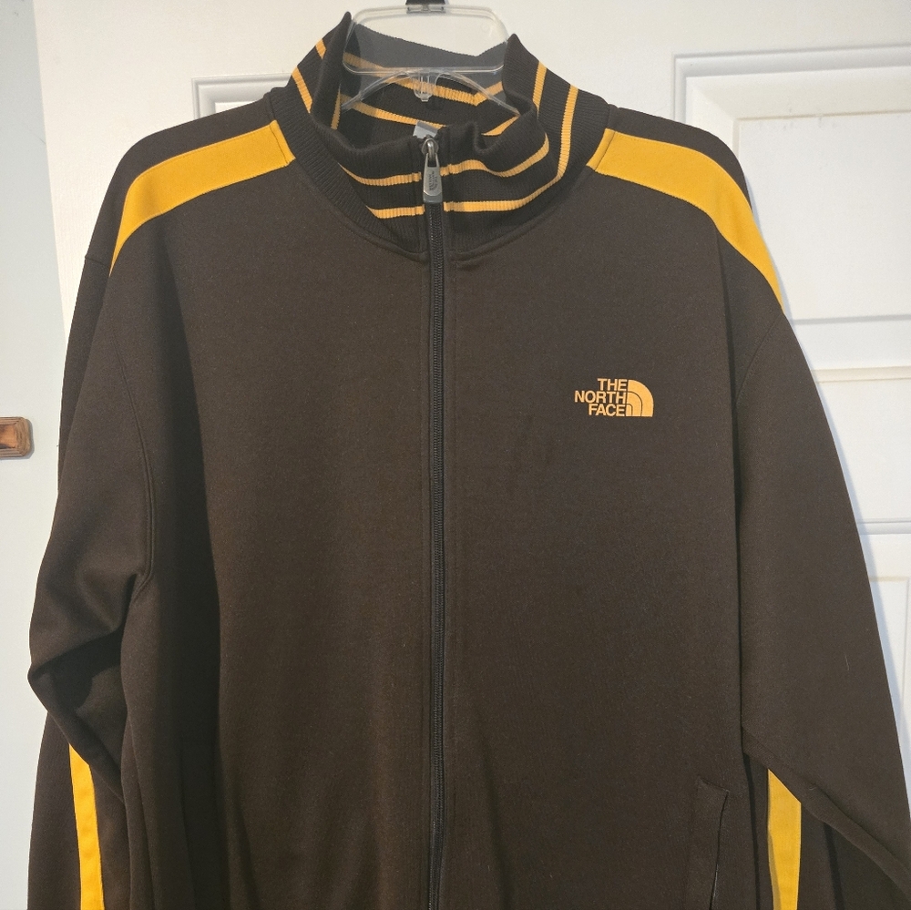 The North Face Brown Jacket with Yellow Stripes